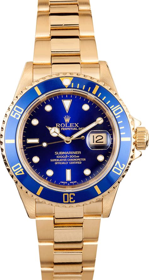 Rolex submariner 18k yellow gold